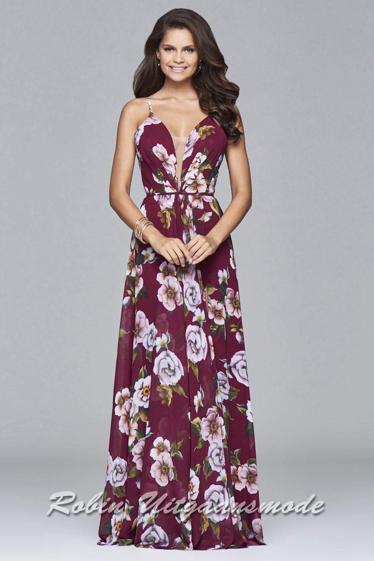 Zomerse lange galajurk met bloemenprint in het rood met gekleurde bloemen