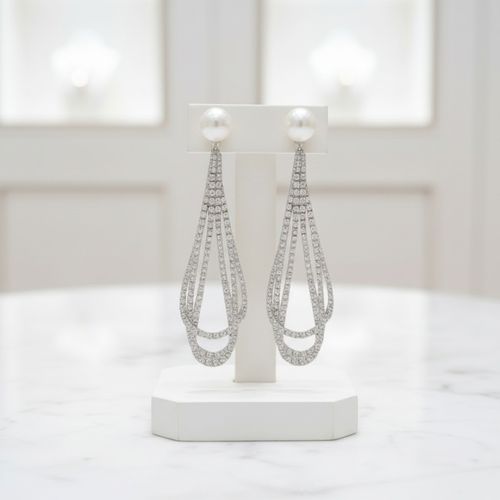 Diva oorbellen met parel knop en sprankelende loops