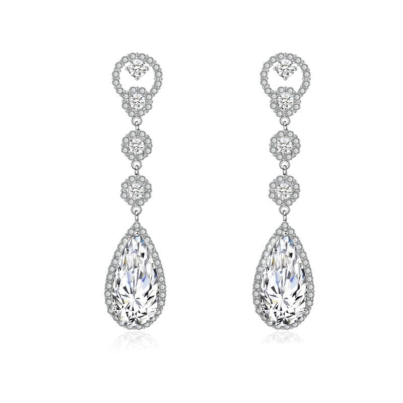 Glamour oorbellen met druppel glaskristal omringt met strass steentjes